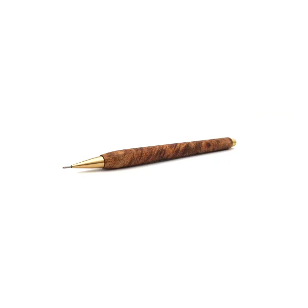 Angled profile of a Nicholas Hemingway handmade mechanical pencil crafted from figured Camphor Burl and solid brass, showing the unique wood grain patterns.
