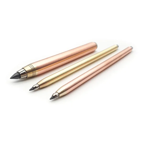2mm copper mechanical pencil shown alongside solid copper and brass 5.6mm clutch pencils Nicholas Hemingway range